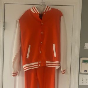 Orange and White Varsity 2pc. Keep in mind, size is unisex